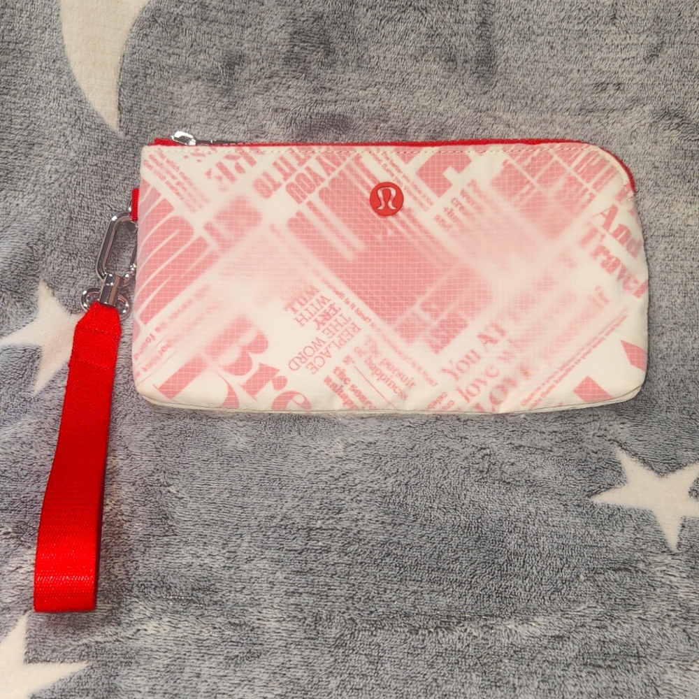 LULULEMON Curved Wristlet Manifesto Print EUC